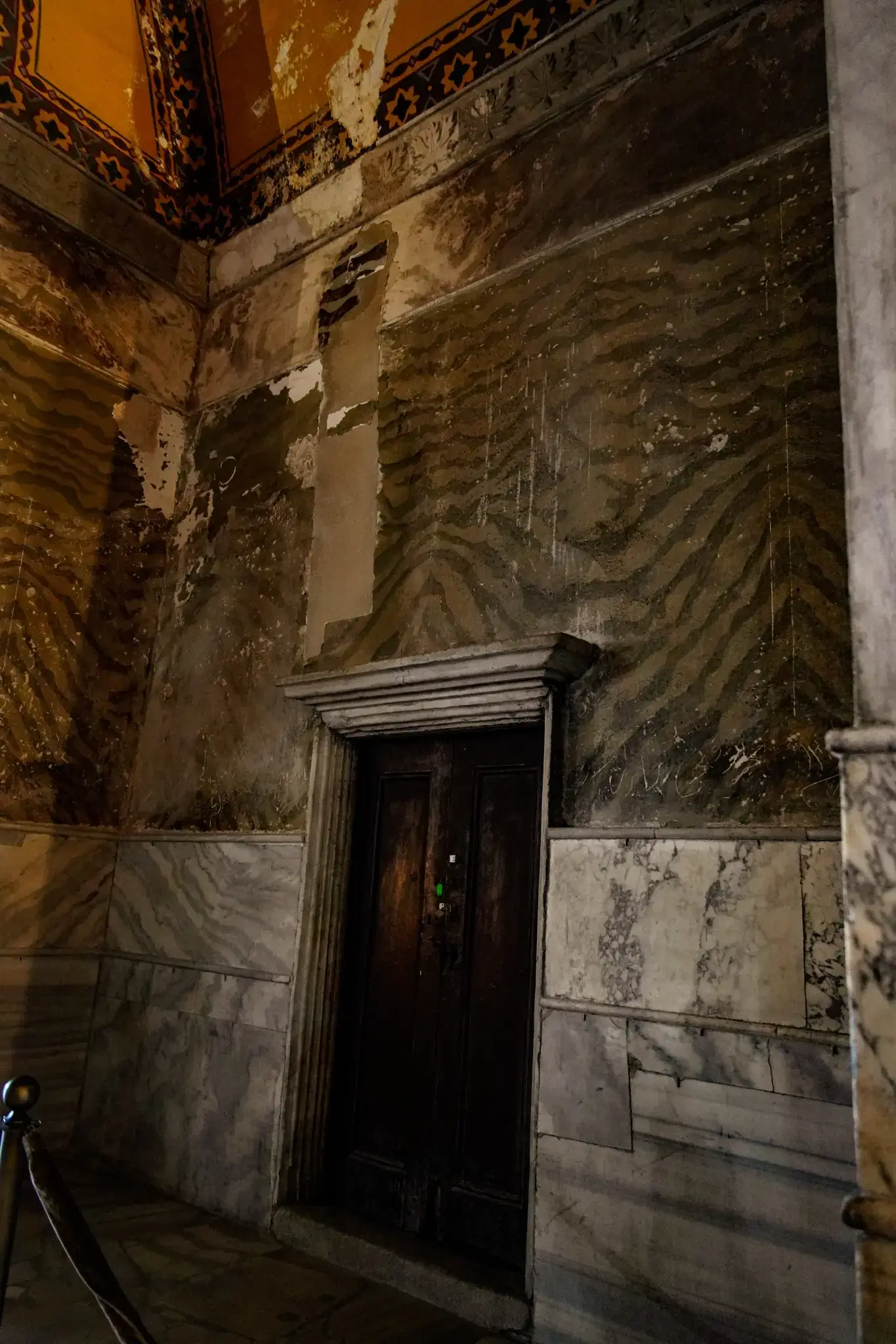 Visitors walking through the upper gallery of Hagia Sophia